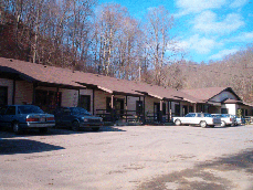 Exterior of the Upper Mill Creek Apartments in Fort Gay, WV on a sunny day